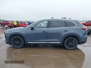 2021 Mazda CX-9 Grand Touring with VIN JM3TCBDY9M0534966, listed as a IAAI auction lot 42166071 with 77,817 mi miles and . Bid and sale history available at DreamBid. Image 14.
