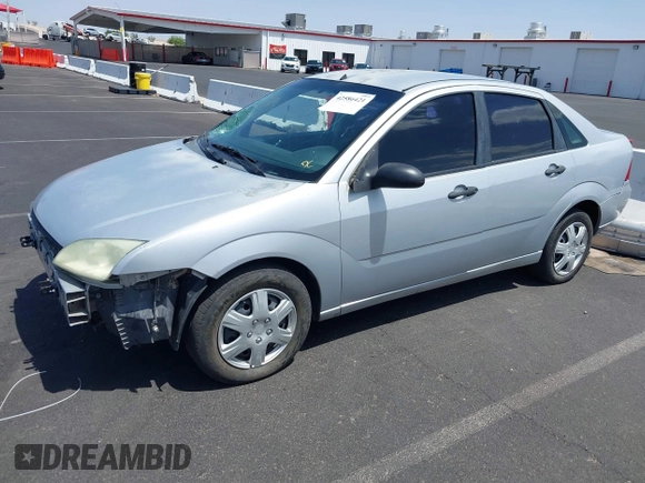 2007 Ford Focus S z VIN 1FAHP34NX7W163158, wystawiony jako IAAI lot #42586421 z przebiegiem 123 131 mil mil oraz . Historia ofert i sprzedaży dostępna na DreamBid. Obrazek 14.