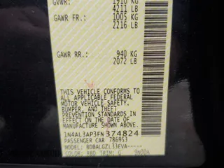 2015 Nissan Altima S with VIN 1N4AL3AP3FN374824, listed as a Copart auction lot 52120065 with 104,189 mi miles and Salvage Title. Bid and sale history available at DreamBid. Image 14.