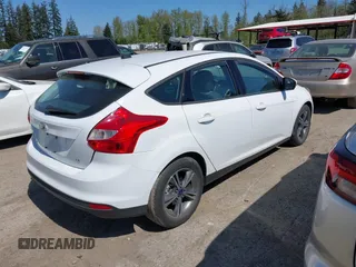 2014 Ford Focus SE with VIN 1FADP3K22EL454565, listed as a IAAI auction lot 42054653 with 19,118 mi miles. Bid and sale history available at carsss.com. Image 4.