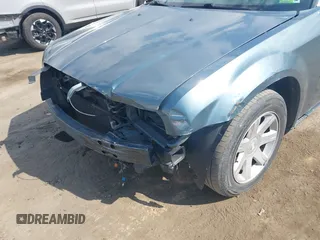 2005 Chrysler 300 with VIN 2C3JA53G35H157178, listed as a IAAI auction lot 41849007 with 149,247 mi miles. Bid and sale history available at carsss.com. Image 6.