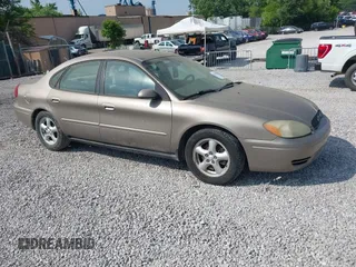 2004 Ford Taurus SE with VIN 1FAFP53U84A132026, listed as a IAAI auction lot 42413671 with 184,618 mi miles and . Bid and sale history available at DreamBid. Image 1.