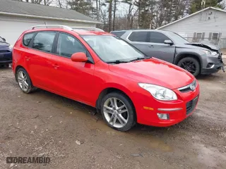 2011 Hyundai Elantra Touring GLS with VIN KMHDC8AE6BU093230, listed as a IAAI auction lot 41710273 with 39,671 mi miles. Bid and sale history available at carsss.com. Image 1.