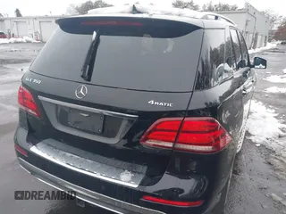 2018 Mercedes-Benz GLE 350 with VIN 4JGDA5HB2JB163672, listed as a IAAI auction lot 41560772 with 76,685 mi miles and . Bid and sale history available at DreamBid. Image 4.