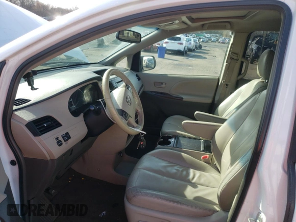 2013 Toyota Sienna XLE with VIN 5TDDK3DC2DS062598, listed as a Copart auction lot 50026545 with 130,719 mi miles and Salvage Title. Bid and sale history available at DreamBid. Image 7.