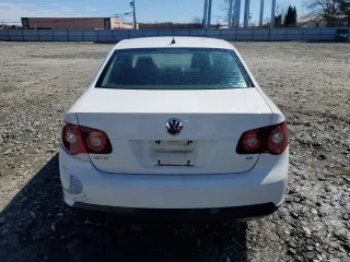 2010 Volkswagen Jetta Limited Edition with VIN 3VWAZ7AJ3AM099385, listed as a Copart auction lot 49352035 with 179,542 mi miles and Salvage title. Bid and sale history available at DreamBid. Image 6.