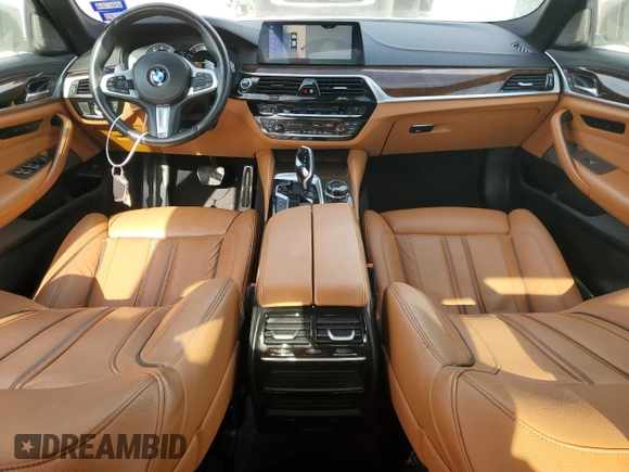 2018 BMW 5 Series M550i xDrive with VIN WBAJB9C58JG464461, listed as a Copart auction lot 53626575 with 62,436 mi miles and Salvage Title. Bid and sale history available at carsss.com. Image 8.