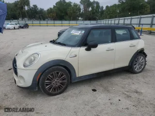 2015 MINI Cooper Hardtop 4 Door S with VIN WMWXU3C59F2B56806, listed as a Copart auction lot 52383055 with 147,817 mi miles and Salvage Title. Bid and sale history available at carsss.com. Image 1.