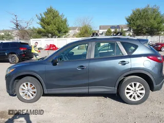 2013 Mazda CX-5 Sport z VIN JM3KE4BE3D0141748, wystawiony jako IAAI lot #41836498 z przebiegiem 163 118 mil mil oraz . Historia ofert i sprzedaży dostępna na DreamBid. Obrazek 14.