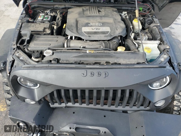 2017 Jeep Wrangler Willys Wheeler with VIN 1C4AJWAG1HL624254, listed as a Copart auction lot 42678975 with 51,936 mi miles and Salvage Title. Bid and sale history available at DreamBid. Image 12.