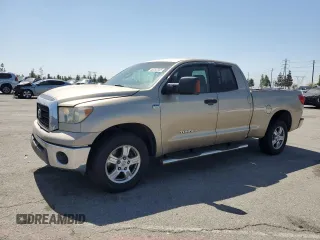 2007 Toyota Tundra SR5 with VIN 5TBRT54167S450458, listed as a Copart auction lot 52242335 with 179,283 mi miles and Salvage title. Bid and sale history available at DreamBid. Image 1.