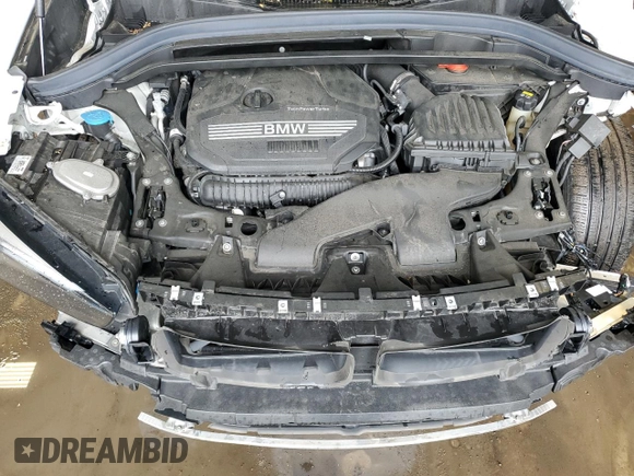 2020 BMW X1 xDrive28i z VIN WBXJG9C09L5P27695, wystawiony jako Copart lot #57039795 z przebiegiem 53 242 mil mil oraz Szkoda całkowita • Salvage title. Historia ofert i sprzedaży dostępna na DreamBid. Obrazek 12.