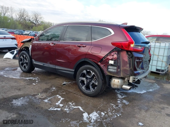 2017 Honda CR-V Touring with VIN 5J6RW2H95HL074264, listed as a IAAI auction lot 41974804 with 94,923 mi miles. Bid and sale history available at carsss.com. Image 3.