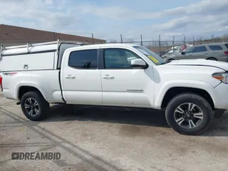 2017 Toyota Tacoma SR5 with VIN 3TMDZ5BN4HM018877, listed as a IAAI auction lot 41898666 with 198,848 mi miles. Bid and sale history available at carsss.com. Image 13.