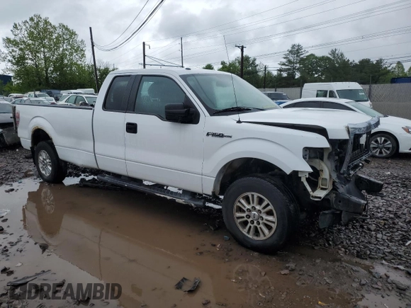 2014 Ford F-150 XL with VIN 1FTVX1EF9EKF11920, listed as a Copart auction lot 53288005 with 152,876 mi miles and Salvage title. Bid and sale history available at DreamBid. Image 4.