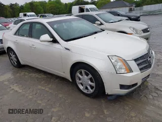 2008 Cadillac CTS RWD w/1SA with VIN 1G6DM577080113516, listed as a IAAI auction lot 41886010 with 275,985 mi miles. Bid and sale history available at carsss.com. Image 1.