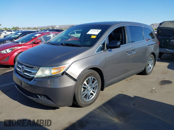 2011 Honda Odyssey EX-L with VIN 5FNRL5H6XBB083980, listed as a IAAI auction lot 42100308 with 191,361 mi miles and . Bid and sale history available at carsss.com. Image 17.