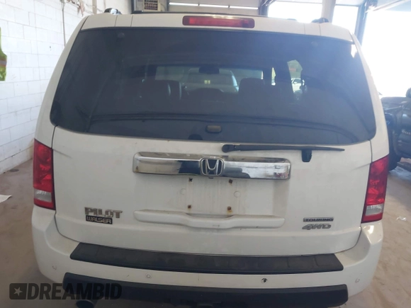 2010 Honda Pilot Touring with VIN 5FNYF4H95AB019903, listed as a IAAI auction lot 42196082 with 233,527 mi miles and . Bid and sale history available at carsss.com. Image 16.