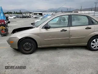 2005 Ford Focus S with VIN 1FAFP34N55W105530, listed as a Copart auction lot 59186695 with 136,204 mi miles and Salvage title. Bid and sale history available at DreamBid. Image 13.