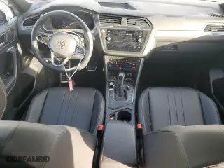 2023 Volkswagen Tiguan SE R-Line Black with VIN 3VVCB7AX8PM121086, listed as a Copart auction lot 45601555 with 27,571 mi miles and Salvage Title. Bid and sale history available at carsss.com. Image 8.