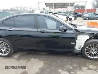 2015 BMW 7 Series 740i with VIN WBAYA6C54FG273188, listed as a IAAI auction lot 42563572 with 70,675 mi miles and . Bid and sale history available at DreamBid. Image 14.
