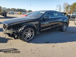 2016 Mercedes-Benz E 400 with VIN WDDKJ6HB4GF317713, listed as a Copart auction lot 88980275 with 141,654 mi miles and Salvage title. Bid and sale history available at DreamBid. Image 1.