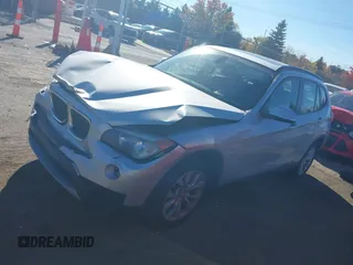 2013 BMW X1 xDrive28i z VIN WBAVL1C52DVR91900, wystawiony jako IAAI lot #40697726 z przebiegiem 115 200 mil mil oraz . Historia ofert i sprzedaży dostępna na DreamBid. Obrazek 2.