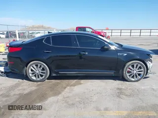 2015 Kia Optima SX Turbo с VIN 5XXGR4A69FG421169, выставлен на аукционе IAAI как лот 41912655 с пробегом 82 380 миль миль и . История ставок и продаж доступна на DreamBid. Изображение 13.
