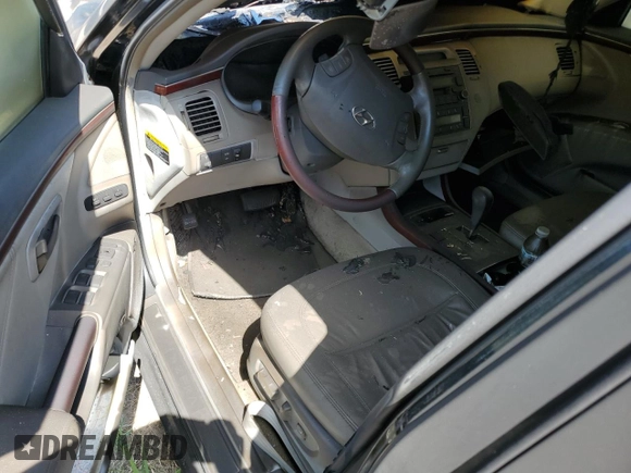 2006 Hyundai Azera SE z VIN KMHFC46F56A035393, wystawiony jako Copart lot #63339195 z przebiegiem Nie podano mil oraz Szkoda całkowita • Salvage title. Historia ofert i sprzedaży dostępna na DreamBid. Obrazek 8.