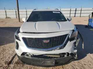 2020 Cadillac XT4 AWD Sport z VIN 1GYFZFR49LF094478, wystawiony jako Copart lot #79454264 z przebiegiem 91 405 mil mil oraz Szkoda całkowita • Salvage title. Historia ofert i sprzedaży dostępna na DreamBid. Obrazek 5.