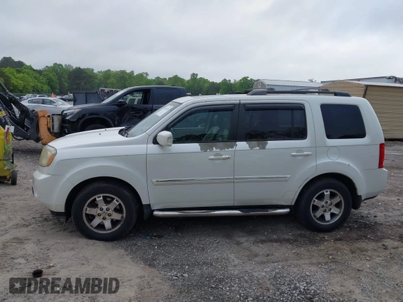2011 Honda Pilot Touring z VIN 5FNYF4H9XBB053966, wystawiony jako IAAI lot #42148528 z przebiegiem 191 939 mil mil oraz . Historia ofert i sprzedaży dostępna na DreamBid. Obrazek 14.