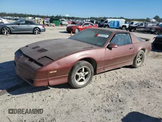 1988 Pontiac Firebird z VIN 1G2FW2184JL232470, wystawiony jako Copart lot #82025924 z przebiegiem Nie podano mil oraz Nie do naprawy • Non repairable. Historia ofert i sprzedaży dostępna na DreamBid. Obrazek 1.
