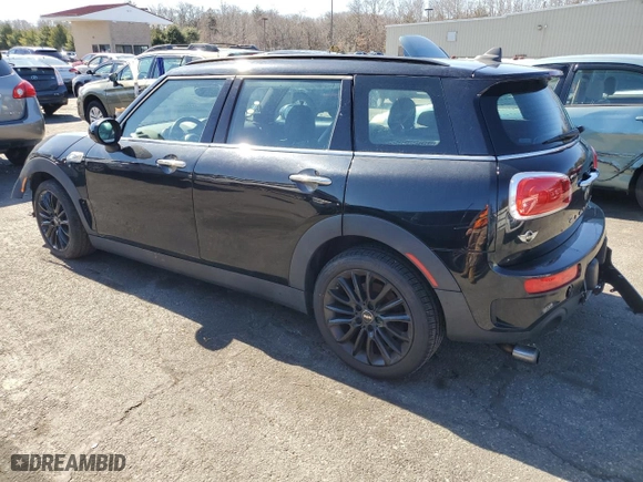 2016 MINI Cooper Clubman S with VIN WMWLN9C54G2E47620, listed as a Copart auction lot 48397725 with 197,658 mi miles and Clean Title. Bid and sale history available at carsss.com. Image 2.