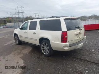 2010 Chevrolet Suburban LTZ with VIN 1GNUKKE35AR129351, listed as a IAAI auction lot 41971625 with 234,487 mi miles. Bid and sale history available at carsss.com. Image 3.