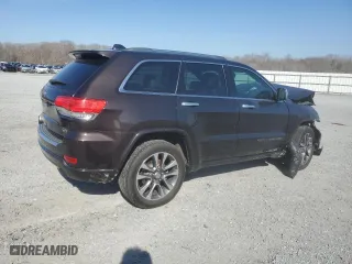 2017 Jeep Grand Cherokee Overland with VIN 1C4RJECG2HC712823, listed as a Copart auction lot 48063325 with 124,812 mi miles and Salvage Title. Bid and sale history available at carsss.com. Image 3.