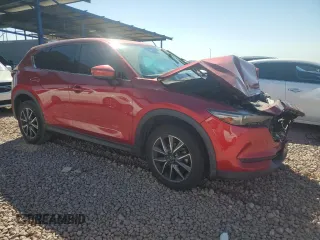 2017 Mazda CX-5 Grand Touring with VIN JM3KFBDL0H0118057, listed as a Copart auction lot 50121335 with 148,275 mi miles and Salvage Title. Bid and sale history available at carsss.com. Image 4.
