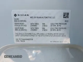 2022 Rivian R1T Adventure z VIN 7FCTGAAA5NN007018, wystawiony jako IAAI lot #42018939 z przebiegiem 41 991 mil mil oraz . Historia ofert i sprzedaży dostępna na DreamBid. Obrazek 9.