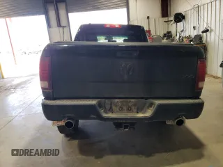2014 Ram 1500 Express z VIN 1C6RR7FT9ES152773, wystawiony jako Copart lot #61879354 z przebiegiem 124 824 mil mil oraz Szkoda całkowita • Salvage title. Historia ofert i sprzedaży dostępna na DreamBid. Obrazek 6.