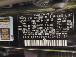 2013 Kia Sorento EX with VIN 5XYKUDA63DG410184, listed as a IAAI auction lot 41416399 with 214,623 mi miles. Bid and sale history available at carsss.com. Image 9.