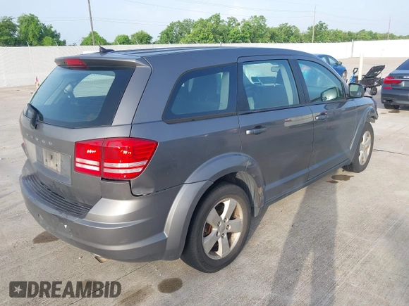 2013 Dodge Journey American Value with VIN 3C4PDCAB8DT586363, listed as a IAAI auction lot 42622716 with 385,195 mi miles and . Bid and sale history available at DreamBid. Image 4.