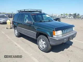 1995 Jeep Grand Cherokee Laredo with VIN 1J4GZ58Y2SC669152, listed as a IAAI auction lot 42077067 with 134,022 mi miles. Bid and sale history available at carsss.com. Image 1.