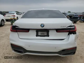 2021 BMW 7 Series 740i with VIN WBA7T2C06MCF88813, listed as a Copart auction lot 49589555 with 60,802 mi miles and Salvage title. Bid and sale history available at DreamBid. Image 6.