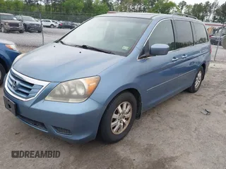 2009 Honda Odyssey EX-L with VIN 5FNRL38709B016019, listed as a IAAI auction lot 42087099 with 227,141 mi miles. Bid and sale history available at carsss.com. Image 2.