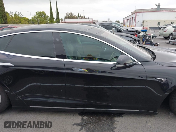 2017 Tesla Model S 100D with VIN 5YJSA1E26HF197176, listed as a IAAI auction lot 42565791 with 120,287 mi miles and . Bid and sale history available at DreamBid. Image 13.