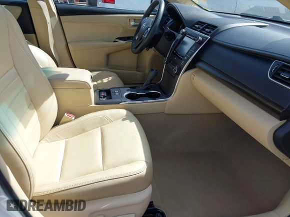 2015 Toyota Camry XLE with VIN 4T1BF1FK1FU977554, listed as a IAAI auction lot 42083589 with 104,811 mi miles and . Bid and sale history available at DreamBid. Image 5.