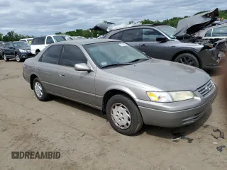 1999 Toyota Camry LE с VIN 4T1BG22K6XU404532, выставлен на аукционе Copart как лот 57449655 с пробегом 173 587 миль миль и Списание • Salvage title. История ставок и продаж доступна на DreamBid. Изображение 4.