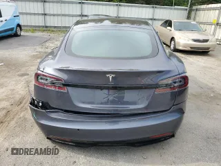 2022 Tesla Model S with VIN 5YJSA1E5XNF471212, listed as a Copart auction lot 57384025 with Not provided miles and Salvage title. Bid and sale history available at DreamBid. Image 6.