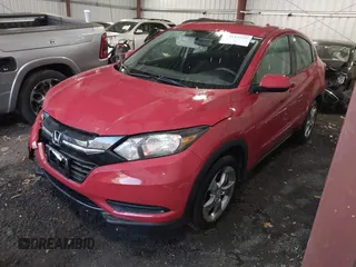 2018 Honda HR-V LX with VIN 3CZRU6H39JG703570, listed as a IAAI auction lot 41013552 with 76,509 mi miles. Bid and sale history available at carsss.com. Image 2.
