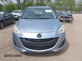 2012 Mazda 5 Grand Touring z VIN JM1CW2DL2C0127851, wystawiony jako IAAI lot #42217090 z przebiegiem 123 900 mil mil oraz . Historia ofert i sprzedaży dostępna na DreamBid. Obrazek 12.