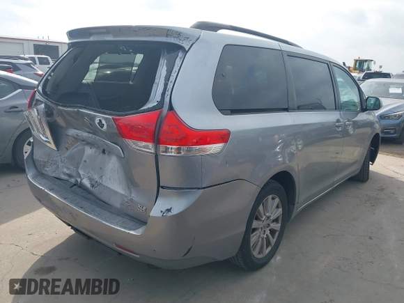 2011 Toyota Sienna XLE with VIN 5TDDK3DC0BS016250, listed as a IAAI auction lot 42156903 with 201,821 mi miles and . Bid and sale history available at DreamBid. Image 4.